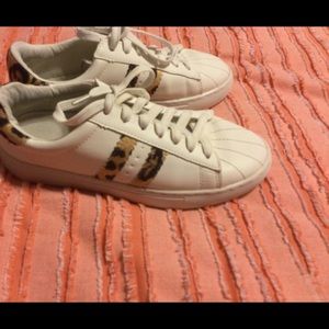 White sneakers with animal print